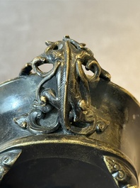 A rare Chinese bronze narcissus basin-shaped censer with dragon handles, Xuande mark, 17th C.