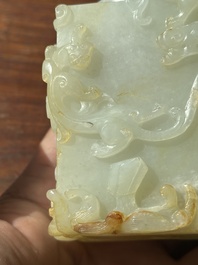 A Chinese white jade 'dragon' ink container with Qianlong mark and possibly of the period