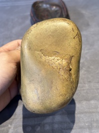 A Chinese scholar's rock on wooden stand, Ming or later