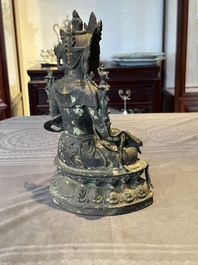 A large Chinese bronze sculpture of Bodhisattva on a lotus throne, Ming
