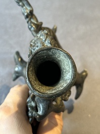 A Chinese bronze vase in the shape of a prunus, Ming
