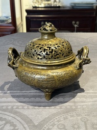 A Chinese imperial archaistic gold-splashed bronze censer and cover with chilong and 'shou' design, Xuande mark, 17th C.
