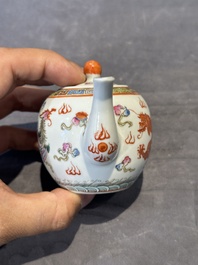 Two Chinese famille rose vases, two teapots and a Japanese wucai ewer, 19th C.