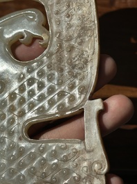 A Chinese nephrite jade ark-shaped 'chilong' plaque, Zhou/Han