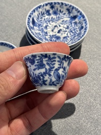 Four Chinese blue and white miniature cups and saucers, butterfly mark, Kangxi
