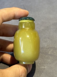 A Chinese yellow jade snuff bottle with moss agate cover and bone stopper, 19th C.