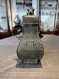 A Chinese archaistic bronze ritual wine vessel and cover in Western Zhou-style, 'fang hu 方壺', Ming