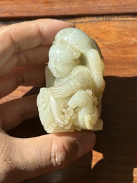 A Chinese white and russet jade 'Lu Ru Feng Qin 鹿乳奉親' carving, Qing