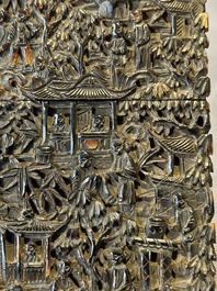 A Chinese jade carving, a tortoiseshell card holder and an iron-red snuff bottle, 19th C.