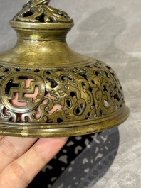 A Chinese imperial archaistic gold-splashed bronze censer and cover with chilong and 'shou' design, Xuande mark, 17th C.