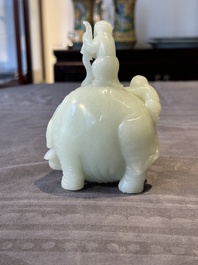 A Chinese celadon jade group of two boys cleansing an elephant, 18th C.