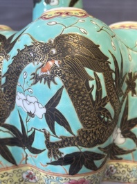 A Chinese famille rose turquoise-ground 'dragon' flower vase, 19th C.