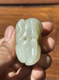 A Chinese white jade carving of a reclining camel, Qing