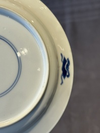 A Chinese blue and white 'Long Eliza and playing boy' cup and saucer, Qi Yu Mei Zhi 奇玉美製 and Bi Yu Tang Zhi 璧玉堂製, Kangxi
