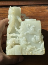 A Chinese white jade 'dragon' ink container with Qianlong mark and possibly of the period