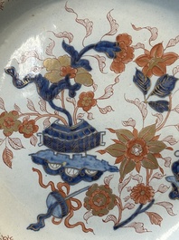 A Dutch Delft Imari-style dish with antiquities, 'AK' mark, 18th C.