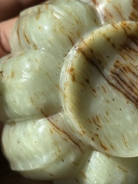 A Chinese celadon and russet jade wedding cup, 18th C.