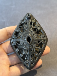 A Chinese reticulated lozenge-shaped double-walled bronze water dropper, 16th C.