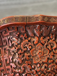 A Chinese red cinnabar lacquer jardiniere with floral design, Yongzheng/Qianlong