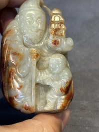 A Chinese jade carving, a tortoiseshell card holder and an iron-red snuff bottle, 19th C.