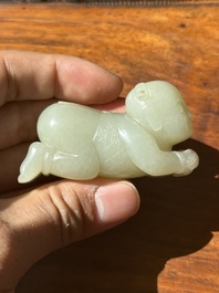 A Chinese white jade carving of a reclining boy, Qing