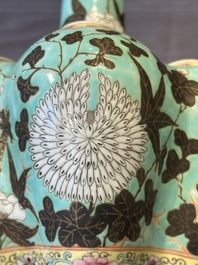 A Chinese famille rose turquoise-ground 'dragon' flower vase, 19th C.