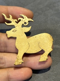 A rare Chinese calcified jade 'deer' pendant, Western Zhou
