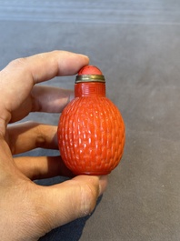 A Chinese coral-red Peking glass snuff bottle imitating a basket, 19th C.