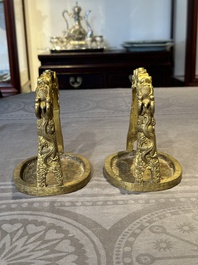 A pair of Chinese imperial gilt-bronze stirrups with dragons, De 德 mark, 18th C.