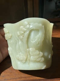 A Chinese white jade 'pine tree' brush pot, Qianlong