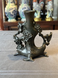 A Chinese bronze vase in the shape of a prunus, Ming
