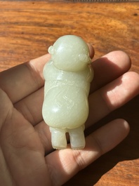 A Chinese white jade carving of a reclining boy, Qing