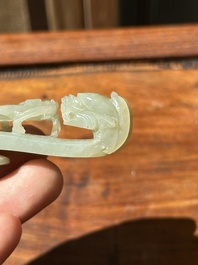 Two fine Chinese white jade carved belt hooks, Qing