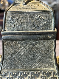 A Chinese archaistic bronze ritual wine vessel and cover in Western Zhou-style, 'fang hu 方壺', Ming