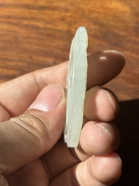 A Chinese white jade 'double phoenix' plaque, Qianlong mark and possibly of the period