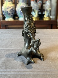 A Chinese bronze vase in the shape of a prunus, Ming