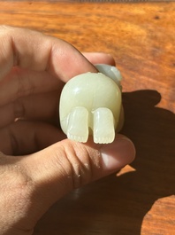 A Chinese white jade carving of a reclining boy, Qing