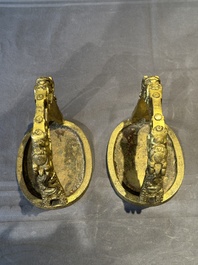 A pair of Chinese imperial gilt-bronze stirrups with dragons, De 德 mark, 18th C.