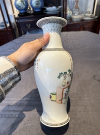 Two Chinese famille rose vases, two teapots and a Japanese wucai ewer, 19th C.