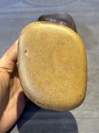 A Chinese scholar's rock on wooden stand, Ming or later