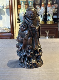 A large Chinese carved bamboo group of 'Hehe Erxian', 17th C.