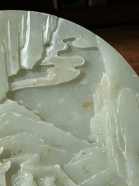 A Chinese celadon and russet jade plaque with landscape design, 19th C.