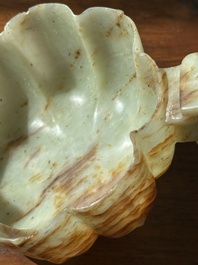 A Chinese celadon and russet jade wedding cup, 18th C.