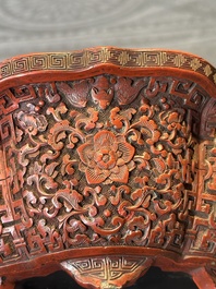 A Chinese red cinnabar lacquer jardiniere with floral design, Yongzheng/Qianlong
