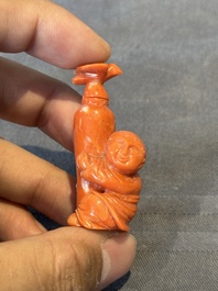 A Chinese carved red coral 'boy and vase' snuff bottle and stopper, 19th C.