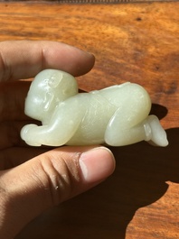 A Chinese white jade carving of a reclining boy, Qing