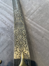 A silver plated dagger and four swords, China, Burma and Indonesia, 18/19th C.