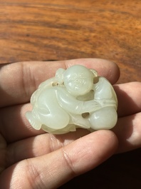A Chinese white jade sculpture of a boy and a double gourd, Qing