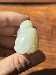 A Chinese white jade carving of a reclining camel, Qing