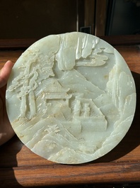 A Chinese celadon and russet jade plaque with landscape design, 19th C.